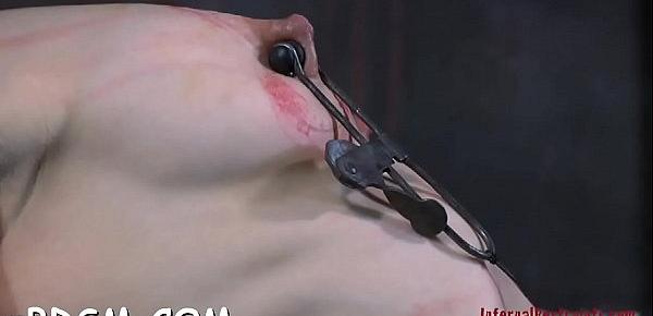  Hottie is chained in shackles during hardcore bdsm torture